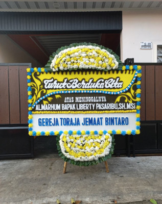 Papan Bunga Duka di Mimika Tengah